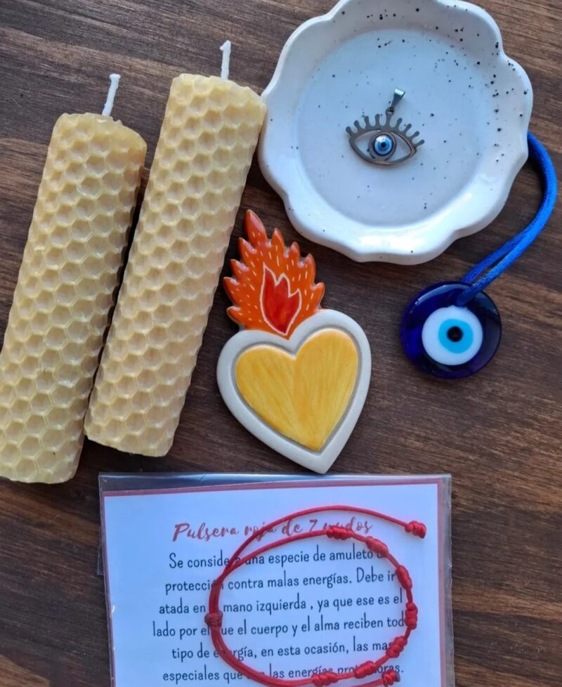 “Un corazón que ama, una vela que alumbra, un ojito que cuida.